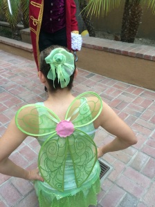 Upside down Tinker Bell wings and the hairpiece my 9-year-old ballerina crafted for me out of the fabric scraps from the tank top.